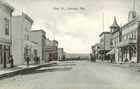 View of Coleman’s main commercial street with stores and shops on either side, ca. 1910