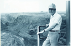 Frank Spragins above Syncrude’s oil sands surface mining operations, n.d. Source: Courtesy of Syncrude Canada Ltd.
