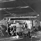 Miners using a universal coal cutter at Lethbridge Collieries, ca. 1950