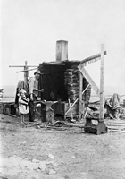 An early blacksmith shop near Lethbridge, showing the anvil used to shape and repair coal-heated metal products