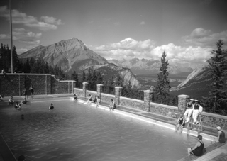 Swimmers Enjoying the Banff Hot Springs, ca. 1935<br/>Source: Whyte Museum of the Canadian Rockies, v263-na-3562
