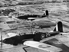 Fairey Battle training aircraft, Lethbridge area, Alberta, ca. 1943; Canada was the primary site for the British Commonwealth Air Training Plan (BCATP), a joint military air training program created by the United Kingdom, Canada, Australia and New Zealand. Because the United Kingdom had neither the space for training facilities nor the security from enemy attack, the Dominions provided air training assistance. By the end of the program in 1945, more than 100 aerodromes and landing fields had been built in Canada, and more than 130,000 air crew members had been trained at these installments. Source: Glenbow Archives, PA-3458-7