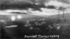 Sunset, Turner Valley, Alberta, ca. 1930s; from 1925 until 1952 at the Turner Valley Gas Plant, hydrogen sulfide was simply vented from the top of the two towers at the right directly into the atmosphere. Source: Glenbow Archives, NA-67-53