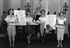Members of the Oil Wives of Calgary Club pose during their 1955 fundraising Revue Show. Their social club founded by wives of oil company managers, and executives, engaged in fundraising activities for local charities.