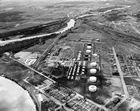 An aerial view of the British American Oil Company’s oil refinery in Calgary, ca. 1950; the Ontario-based oil company was Canada’s second largest oil company by the 1920s. The company had been operating in Alberta’s oil sector since the 1930s. In 1969, British American merged with two other oil companies to form Gulf Oil Canada Ltd. 