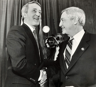 Peter Lougheed, Premier of Alberta (right), greets Brian Mulroney, Prime Minister of Canada (left), 1984. Source: CP Photo/Pat Price, 673836
