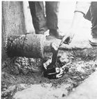 Bitumen that has been separated from the oil sands oozes out of this pipe at the International Bitumen Company Ltd. plant at Bitumount, early 1940s. Source: University of Alberta Archives, 83-160-34