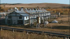 The compressor plant is one of the extant buildings at the Turner Valley Gas Plant Historic Site, 2002. <br />Source: Alberta Culture and Tourism