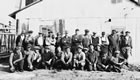 Oil well workers pose for a photo, late 1920s. <br />Source: Glenbow Archives, NA-2570-20