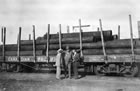 Casings for Turner Valley wells are located on a rail car, likely at the Okotoks railhead, ca. 1914. These casings would be unloaded and transported to the drilling site by horse and wagon. <br />Source: Glenbow Archives, PA-3670-14