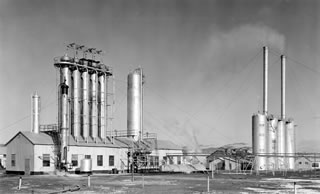 Royalite installs a Girbotol natural gas sweetener, which allows for the increased production of natural gas. This helps meet the increased demand for natural gas during the Second World War, particularly for the Allied War Supplies Corporation south of Calgary. <br />Source: Glenbow Archives, IP-6d-4-7b