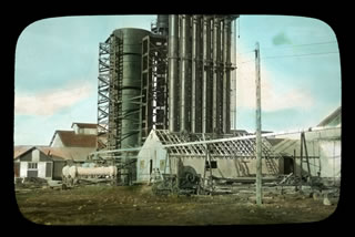 Royalite builds a new scrubbing plant using the Seaboard soda ash process to remove toxic hydrogen sulfide and "sweeten" the sour gas. This signals the beginning of a major expansion of the Turner Valley gas plant. <br />Source: Glenbow Archives, S-17-110
